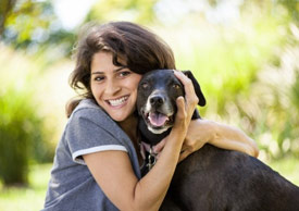 new century compounding woman with dog